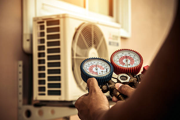 Professional Heat Pump Repair technician working in Enfield, NC